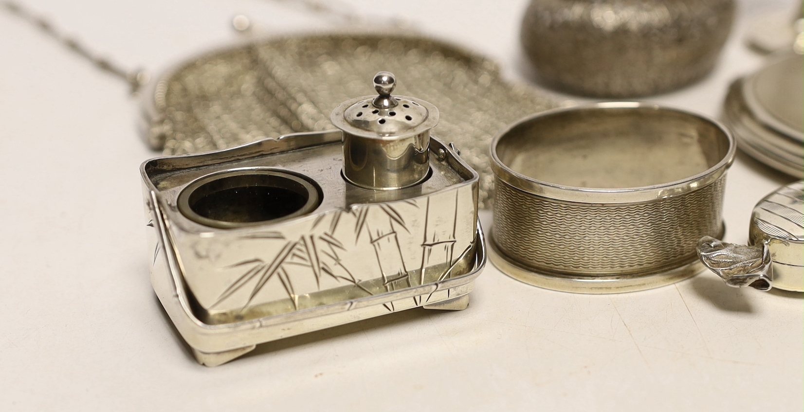 Sundry small silver and white metal items including two silver compacts, penknife, pedestal salt, Japanese sterling condiment, tot, evening bag, filigree box, lipstick holder, bookmark etc.